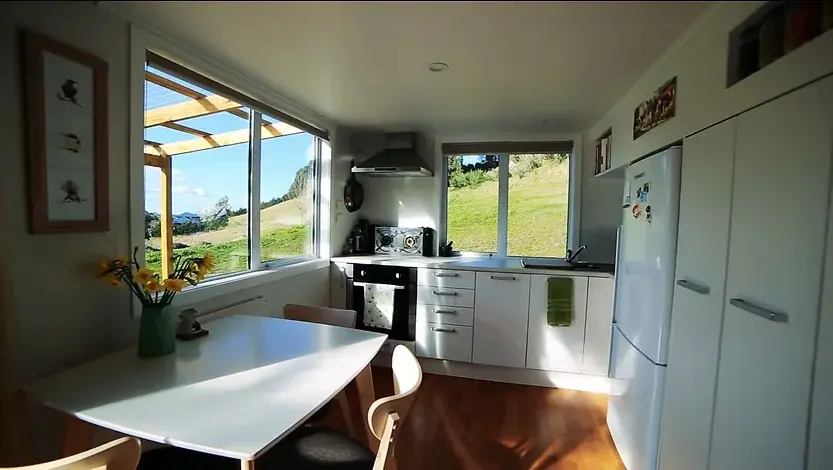0345 Unique 23F tiny house with 9 windows climbing wall smallhometours.com 7