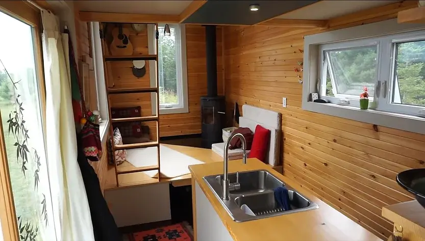 0350 Woman spends 3 years living off grid tiny house smallhometours.com 3