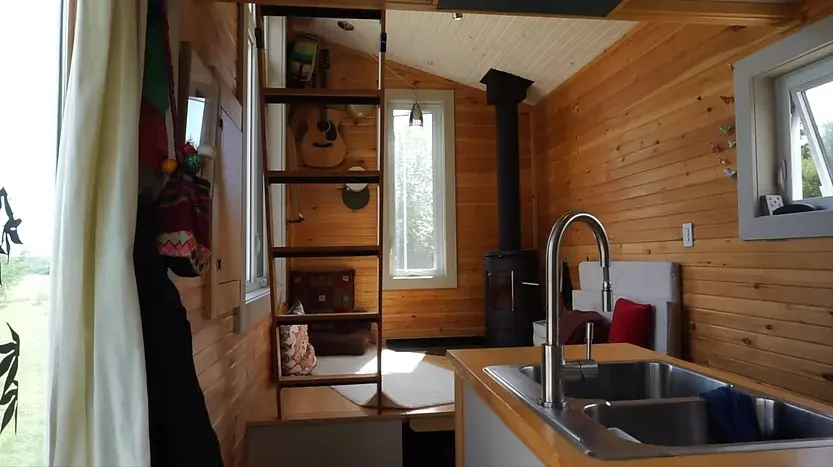 0350 Woman spends 3 years living off grid tiny house smallhometours.com 6