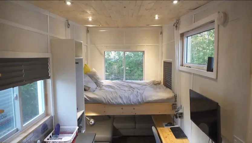 0353 DIY tiny house with clever elevator bed build by young man super cheap smallhometours.com 1