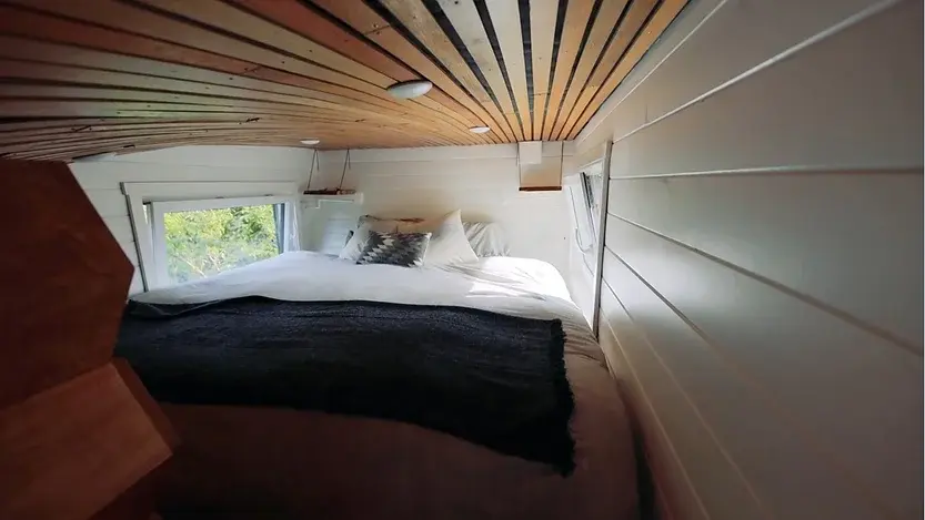 0355 Tiny house natural built with biophilic design elements Fibonacci curve roofline smallhometours.com 2