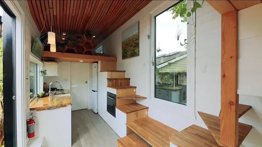 0355 Tiny house natural built with biophilic design elements Fibonacci curve roofline smallhometours.com 3