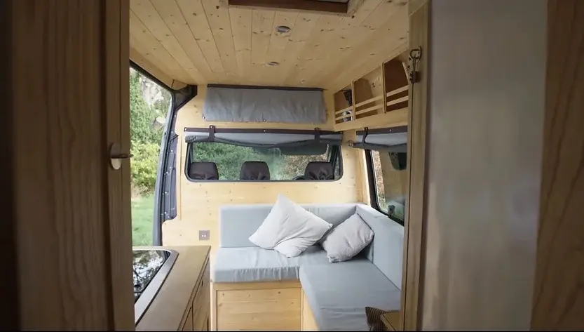 0356 Incredible van conversion inspired by the inside of a wooden boat smallhometours.com 1