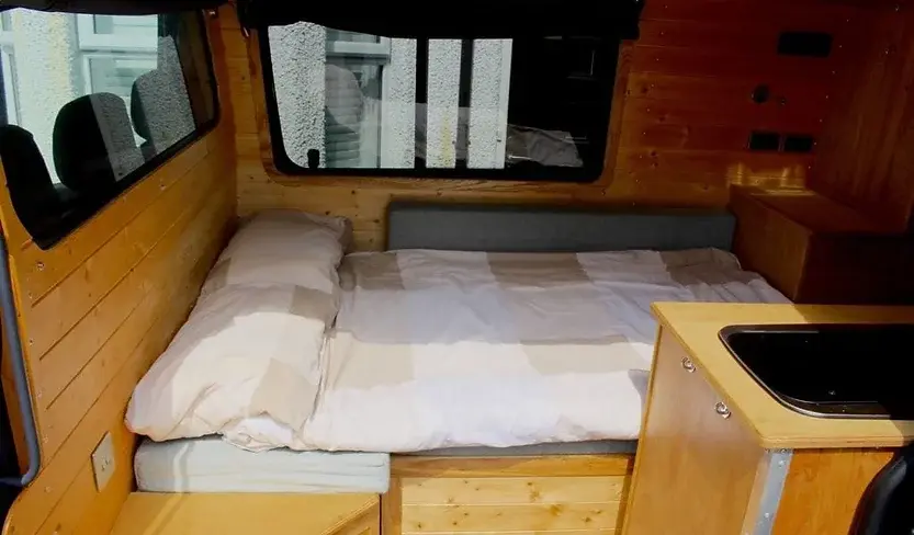 0356 Incredible van conversion inspired by the inside of a wooden boat smallhometours.com 2