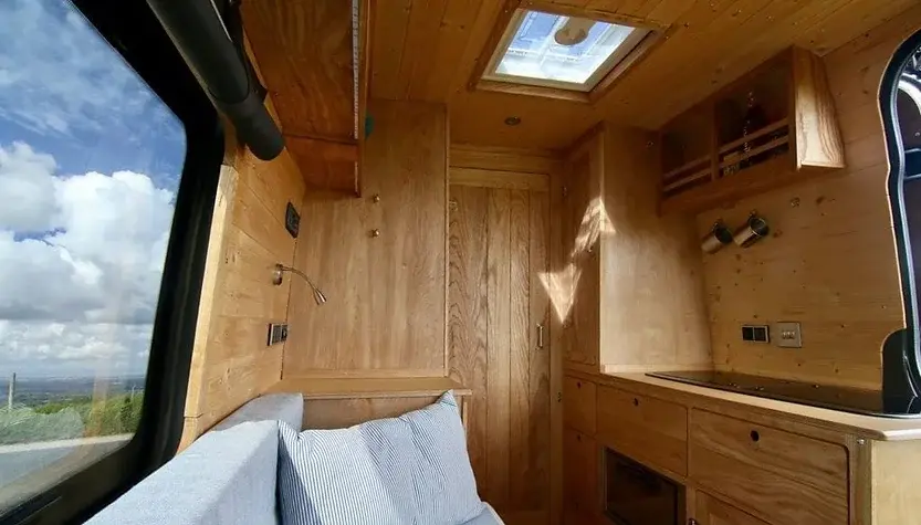 0356 Incredible van conversion inspired by the inside of a wooden boat smallhometours.com 4