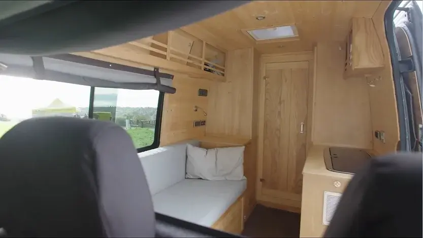 0356 Incredible van conversion inspired by the inside of a wooden boat smallhometours.com 5