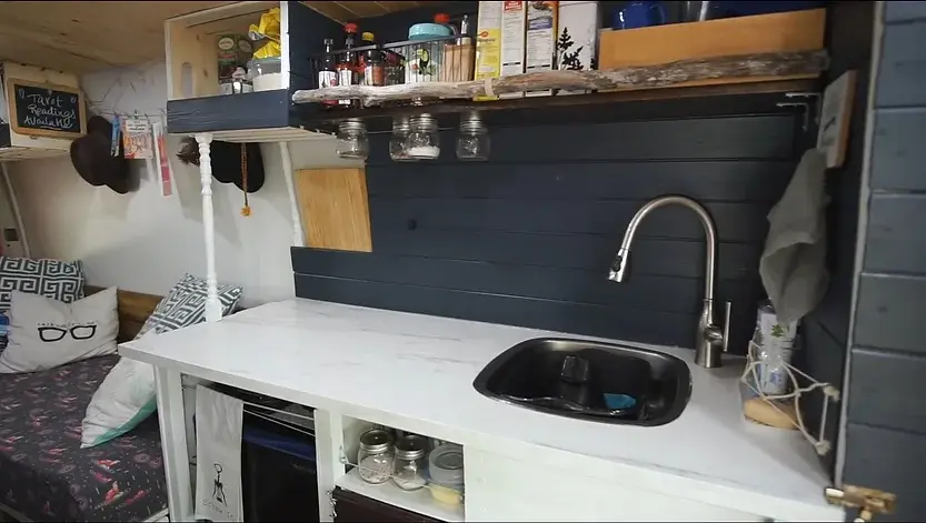 0361 DIY camper van functional beautiful build by this amazing couple on low budget smallhometours.com 3