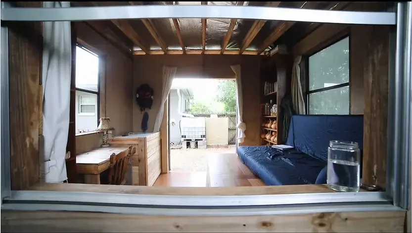 0362 Man living in a 10x10 tiny house making his own fuel using a biodigester growing toilet paper smallhometours.com 2