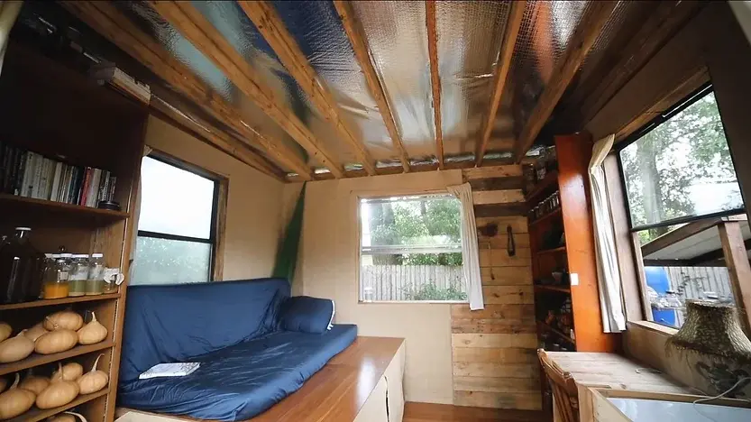 0362 Man living in a 10x10 tiny house making his own fuel using a biodigester growing toilet paper smallhometours.com 4