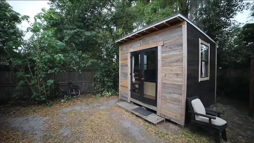 0362 Man living in a 10x10 tiny house making his own fuel using a biodigester growing toilet paper smallhometours.com 6