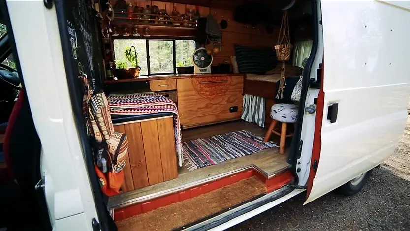 0366 Lovely off grid convert van for full time living with coolest feature the pull out deck smallhometours.com 2