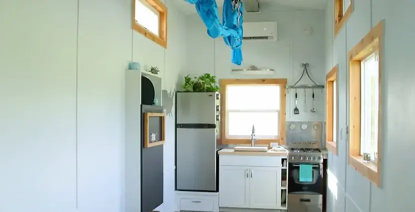0378 Tiny house that doubles as a yoga studio with aerial hammocks monkey bars smallhometours.com 3