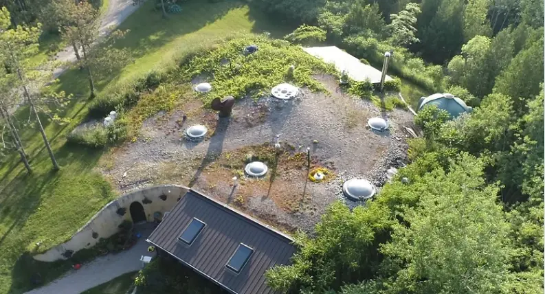 0379 Underground dome house family use the earths energy to stay warm smallhometours.com 2