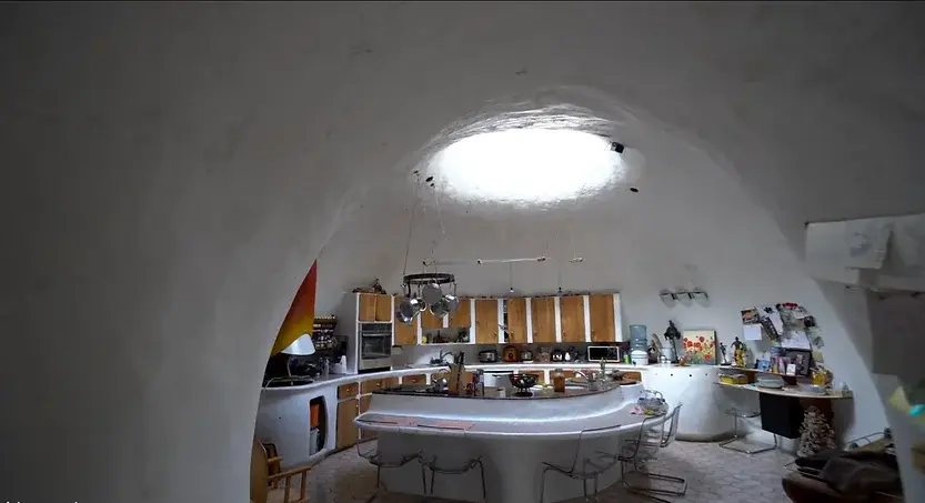 0379 Underground dome house family use the earths energy to stay warm smallhometours.com 4