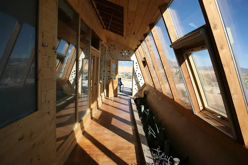 0382 Off grid earthship house that catches its own rain water generates its own electricity smallhometours.com 1