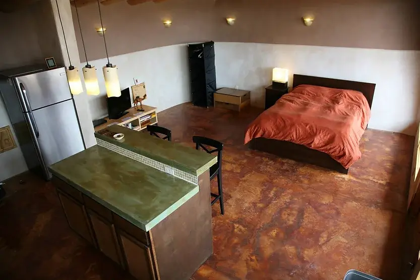 0382 Off grid earthship house that catches its own rain water generates its own electricity smallhometours.com 3