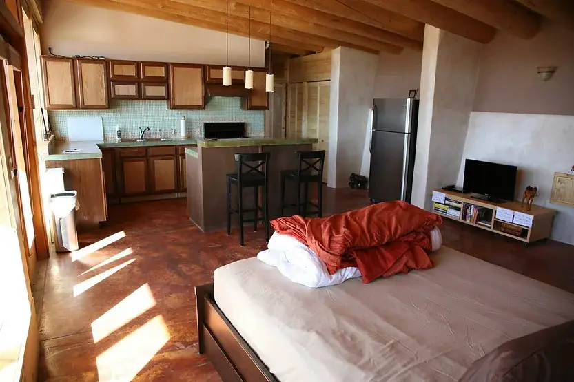 0382 Off grid earthship house that catches its own rain water generates its own electricity smallhometours.com 4