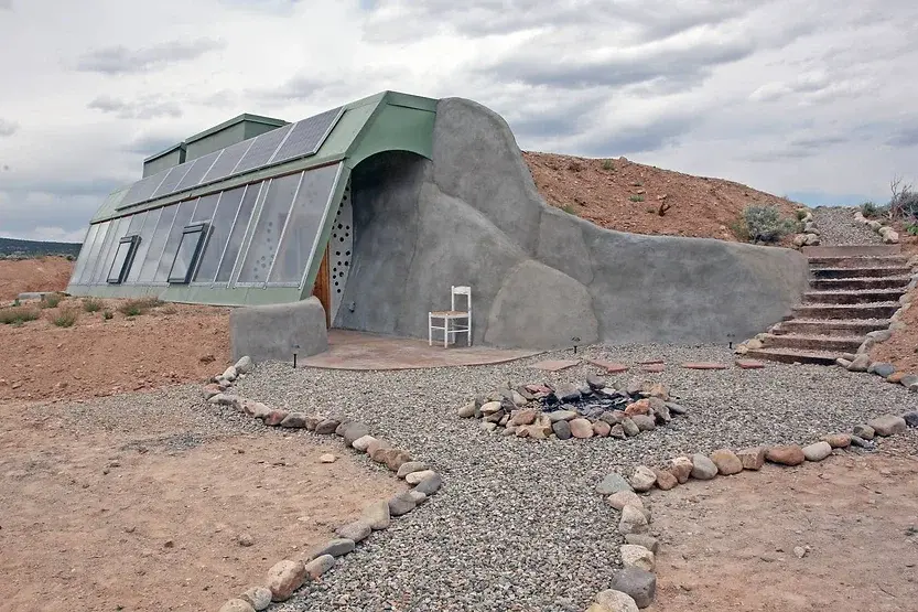 0382 Off grid earthship house that catches its own rain water generates its own electricity smallhometours.com 5