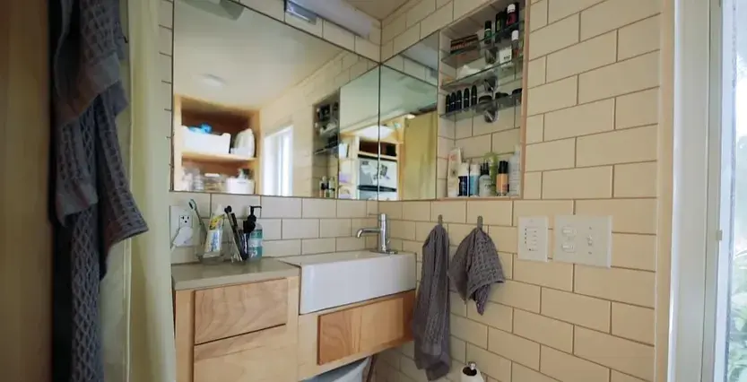 0384 Architecturally designed tiny house with secret shower smallhometours.com 6