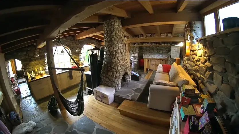 0385 Off grid homesteading family lives in a renovated stone earthship smallhometours.com 7