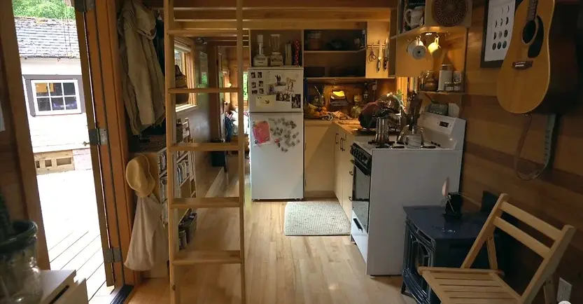 0396 How this frugal family of 4 paid off 96k in debt built a custom tiny house smallhometours.com 2