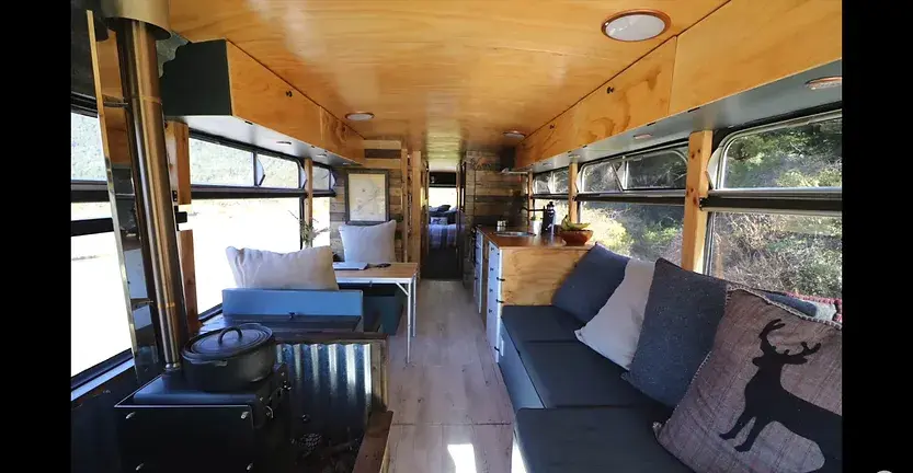 0397 This inspiring couple quit their 9 5 jobs to live travel in a DIY off grid school bus conversion smallhometours.com 4