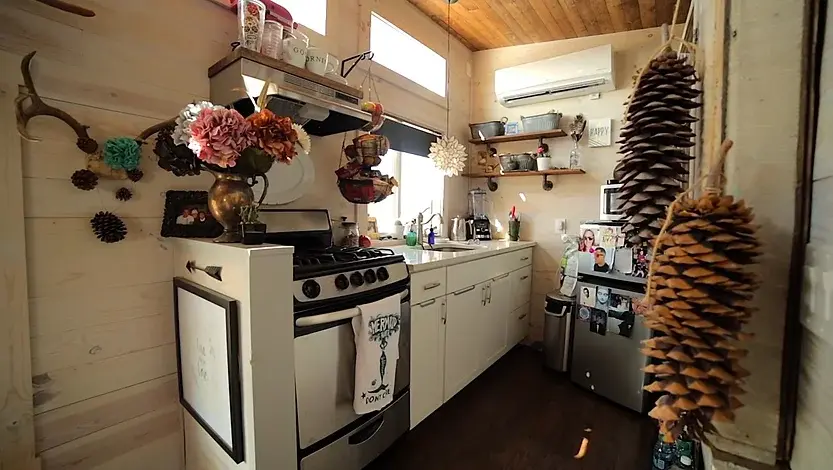 0409 Womans Eclectic 10 wide tiny house in small house retirement communities smallhometours.com 3