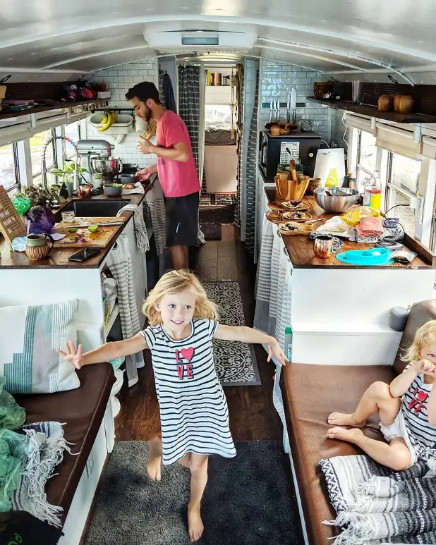 0412 Family of 5 live and travel in DIY bus conversion going debt free smallhometours.com 1