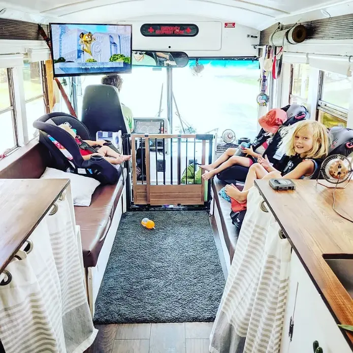 0412 Family of 5 live and travel in DIY bus conversion going debt free smallhometours.com 5