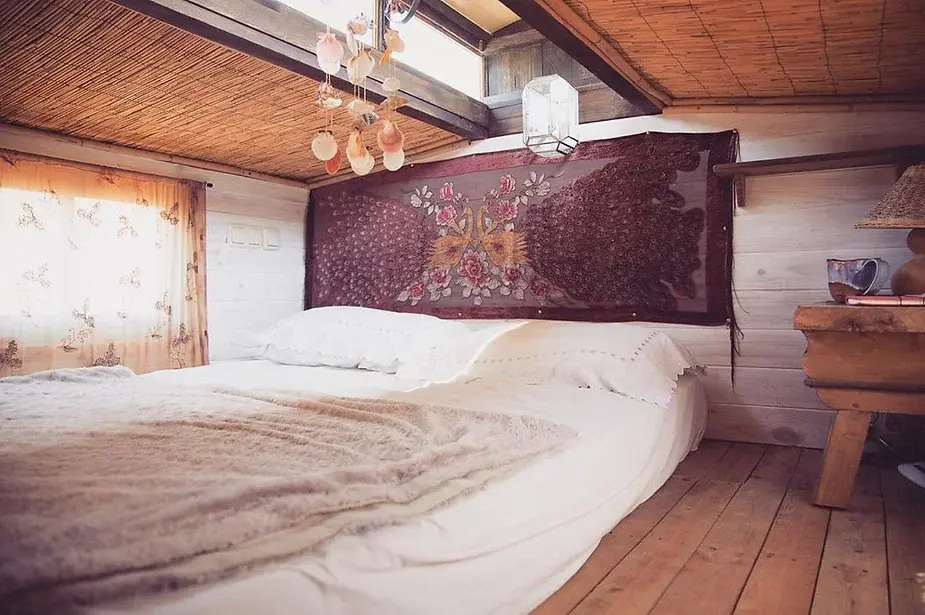 0447 Women builds a tiny house for only 5000 E from a old van base smallhometours.com 4