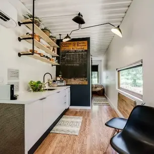 0449 Minimal tiny house with Industrial modern flare one unit shipping container home smallhometours.com 3