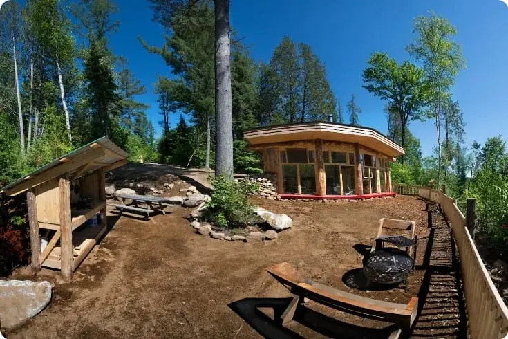 0454 Mini Earthship style cabin incredible tiny off grid house with solar power smallhometours.com 1