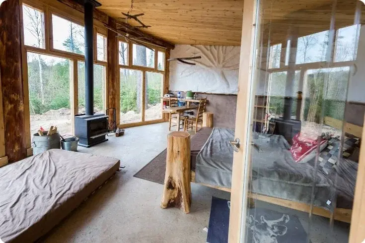 0454 Mini Earthship style cabin incredible tiny off grid house with solar power smallhometours.com 3
