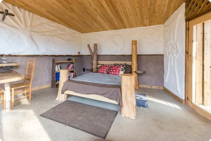 0454 Mini Earthship style cabin incredible tiny off grid house with solar power smallhometours.com 5