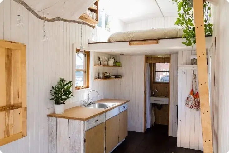 0456 Open concept minimalist 25 foot tiny house built with reclaimed materials smallhometours.com 1