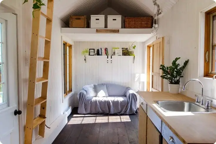 0456 Open concept minimalist 25 foot tiny house built with reclaimed materials smallhometours.com 3