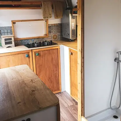 0459 Living in tiny house on wheels off grid 3000 Sprinter van conversion smallhometours.com 1
