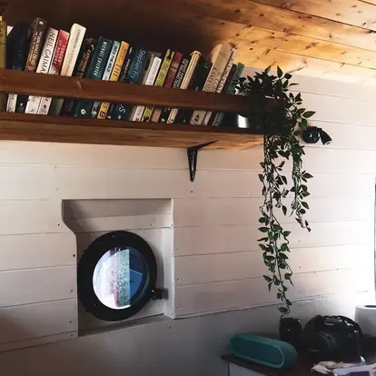 0459 Living in tiny house on wheels off grid 3000 Sprinter van conversion smallhometours.com 2