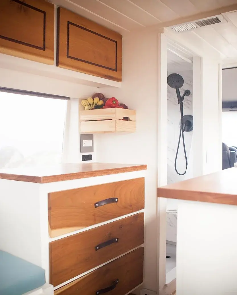 0462 Functional tiny house on wheels DIY sprinter camper van with shower bathroom smallhometours.com 1