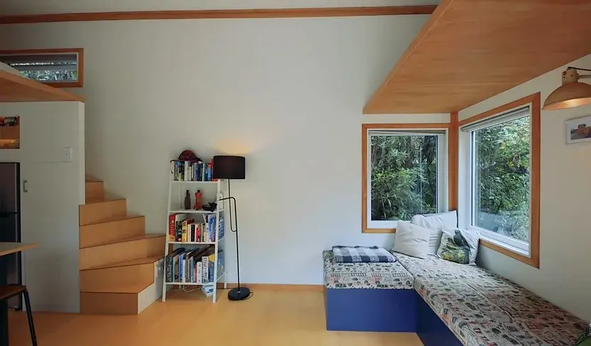 0469 Couples built amazing DIY tiny house in the middle of a nudist club smallhometours.com 2