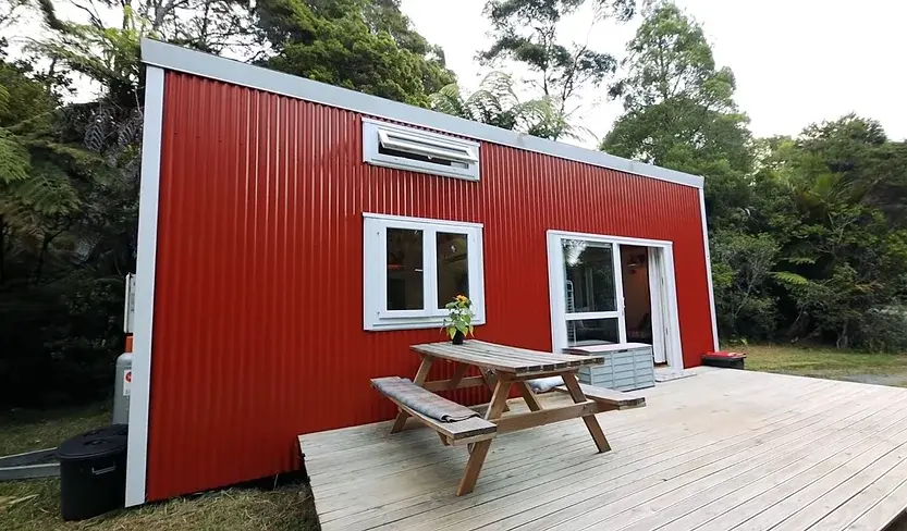 0469 Couples built amazing DIY tiny house in the middle of a nudist club smallhometours.com 3