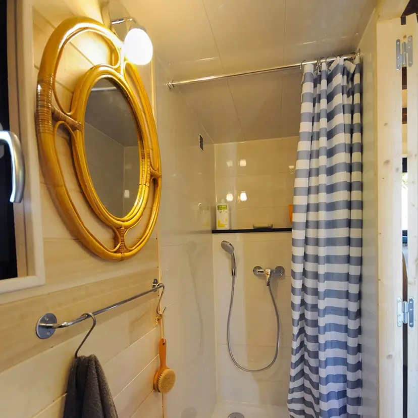 0471 Georges tiny house with a large sheltered porch smallhometours.com 4