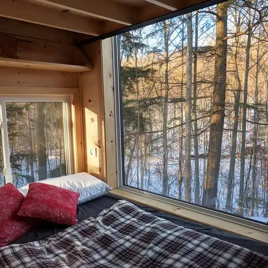 0490 Lovely off grid tiny house with dual bed design garage door window smallhometours.com 1