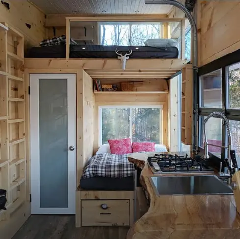 0490 Lovely off grid tiny house with dual bed design garage door window smallhometours.com 2
