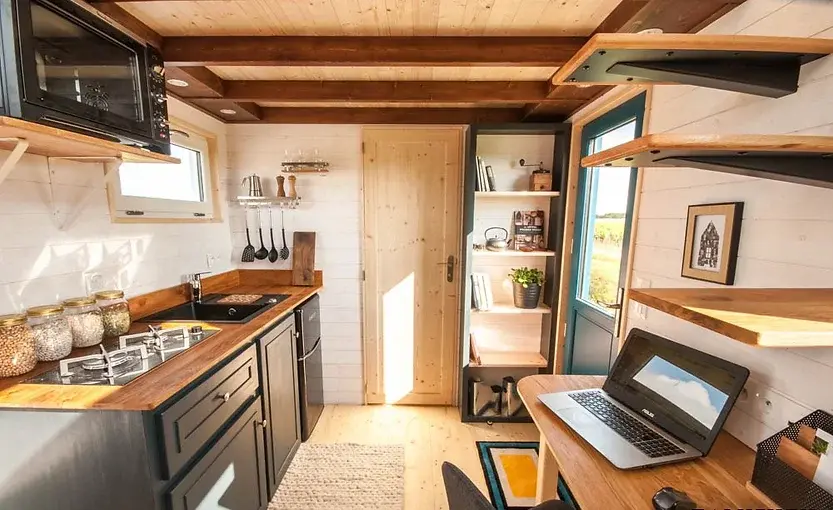 0492 Beautiful tiny house with a single slope architecture which gives it maximum interior volume smallhometours.com 4