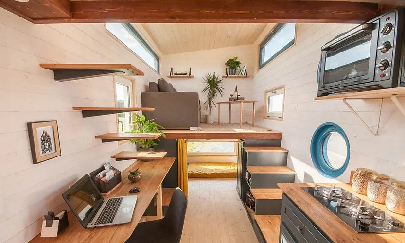 0492 Beautiful tiny house with a single slope architecture which gives it maximum interior volume smallhometours.com 5