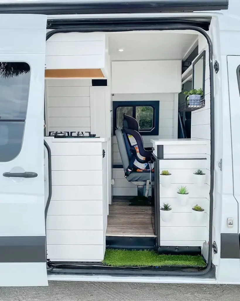 0493 Family of 3 their beautiful promaster van conversion smallhometours.com 2