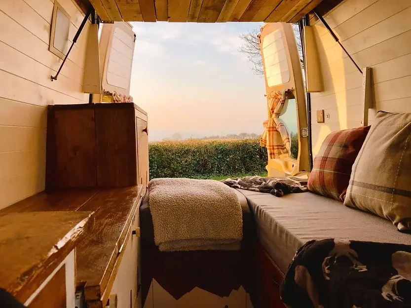0510 Amazing 2007 Ford transit camper van with a cozy wood burning stove smallhometours.com 6