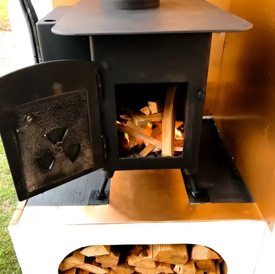 0510 Amazing 2007 Ford transit camper van with a cozy wood burning stove smallhometours.com 8