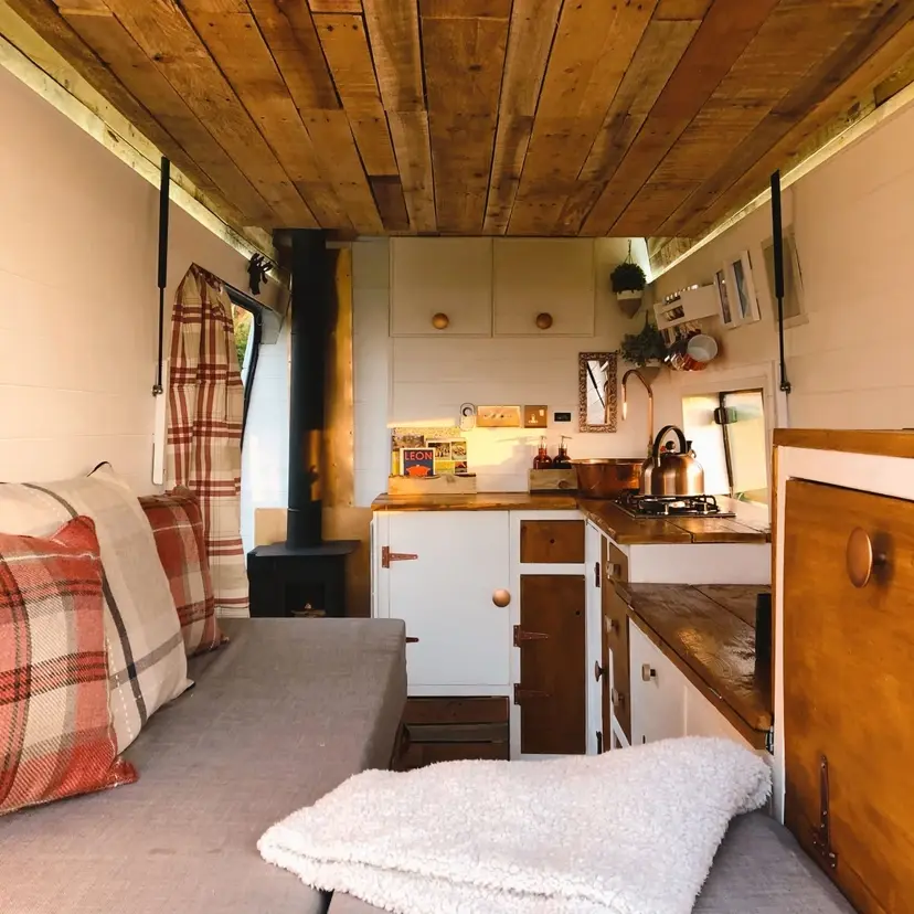 0510 Amazing 2007 Ford transit camper van with a cozy wood burning stove smallhometours.com 9